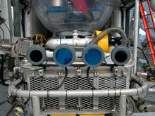 Photograph of four 400W HMI lights mounted on the submersible work basket.
