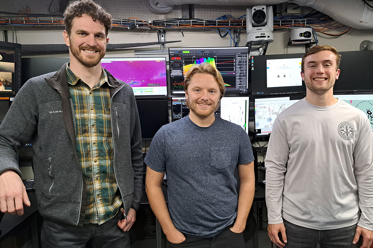 Three explorers-in-training in the control room on NOAA Ship Okeanos Explorer.