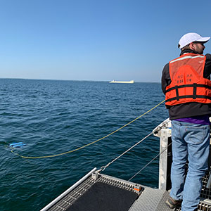 AUV Dory is deployed from R/V Storm for an autonomous shipwreck survey.