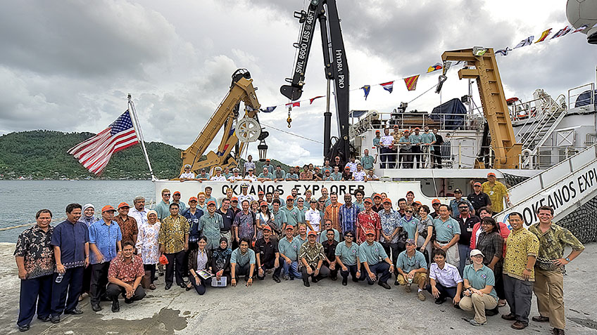 Following the joint expedition's closing ceremony, Chief Bosun Carl VerPlanck coralled participants for a final group photo. Available crew members from both NOAA Ship Okeanos Explorer and the Indonesian Research Vessel Baruna Jaya IV, as well as technicians, scientists and program managers are pictured. Image courtesy of NOAA Okeanos Explorer Program, INDEX-SATAL 2010.