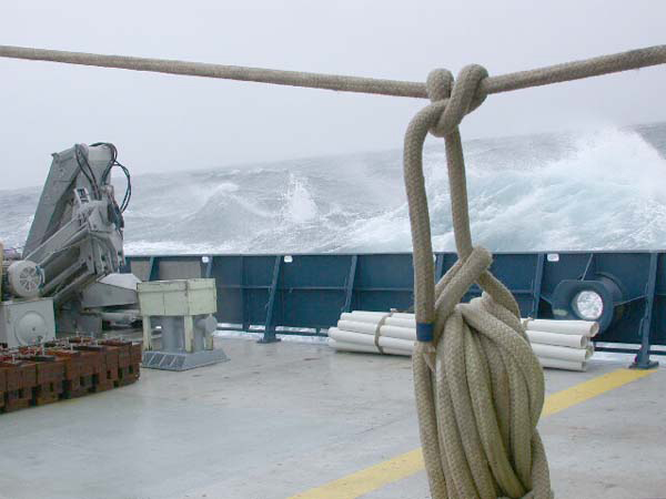 Wind and waves off the port stern