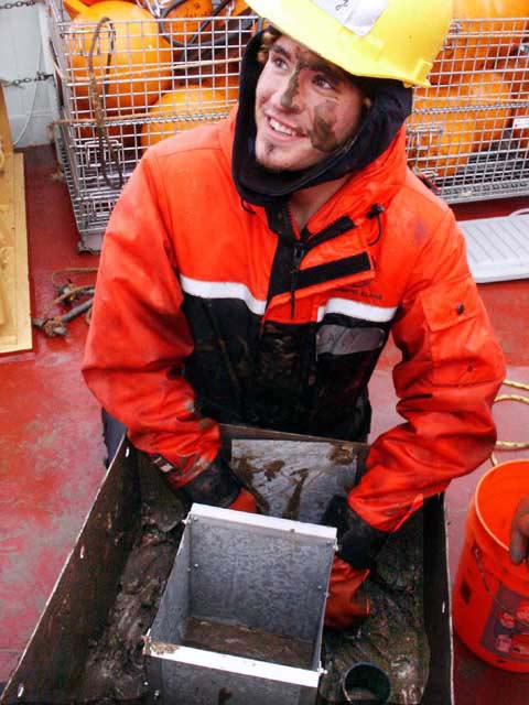 Casey Debenham processes the box core sample