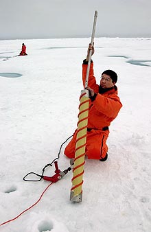 Qing Zhang removes an ice core