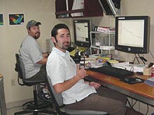 Paul Johnson (left) and Lee Murai, processing data