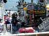 Submersible pilots show students the  equipment on the front of the Johnson-Sea-Link