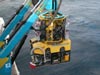 The tether management system sits on top of the ROV during deployment and recovery of the sub