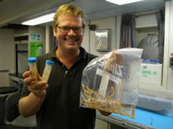 Peter Etnoyer in the wet lab of the R/V Ron Brown