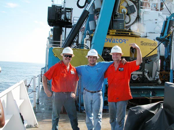 Sonsub technicians victory pose after a successful ROV test dive