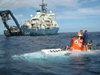 Swimmers Mark Spear and Carl Wood, recovering Alvin after a dive on Manning Seamount.