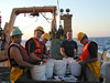 Sorting animals from the trawl catch at Bear Seamount in 2002. From left to right: Dr Tracey Sutton, Dr Jon Moore, Edward McChain, Chris Kenaly, Dr Michael Vecchione.