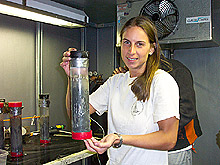 Taylor Heyl holding a push core from the submersible Alivn.