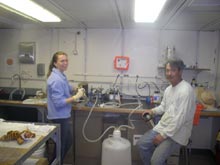 Seawater is filtered by Naomi Ward and Bosun Patrick Hennessy. Bacterial cells are traped in very small pore size filters for later identification.