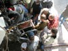 Scientists swarm the basket after Alvin’s return to the surface.