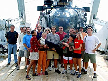 The Deep Scope mission team gather in front of the Harbor Branch submersible.