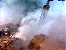 ROPOS capturing droplets from the seafloor at Champagne vent site.