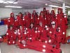 Some of the members of the science party posed in their survival suits after a drill.