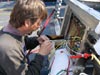 IFE ROV electrical engineer Dave Wright fixes the Argus wiring that malfunctioned