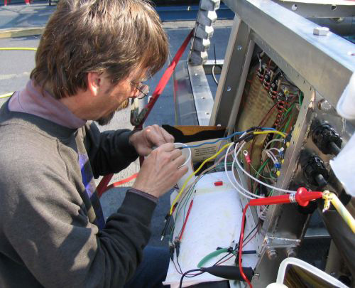 IFE ROV electrical engineer Dave Wright fixes the Argus wiring that malfunctioned