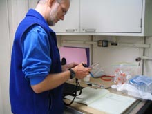 Dr. Jon Moore works with specimens collected from Bear Seamount.