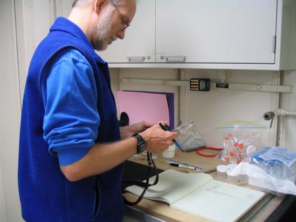 Dr. Jon Moore works with specimens collected from Bear Seamount.