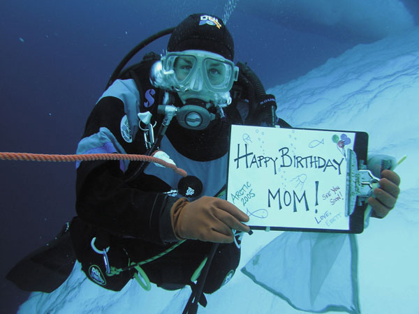 Ice diver Elizabeth Calvert gets creative making a birthday card she can digitally send.