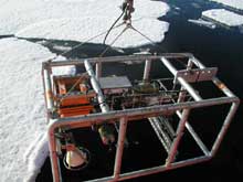 The photo platform is deployed over icy waters.