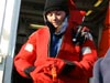 Kelley Elliott, web coordinator for the Hidden Ocean expedition, practices emergency safety procedures