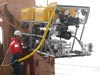 A Healy technician does a final check of the ROV's systems before deployment.