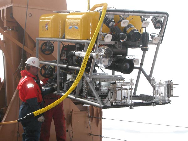 A Healy technician does a final check of the ROV's systems before deployment.