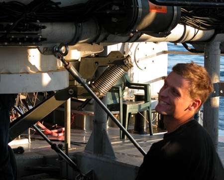 Dr. Murray Roberts prepares to enter the stern compartment of the 
		    Johnson-Sea-Link submersible for his first dive.