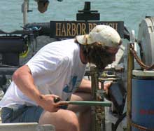 Engineer Kevin Bradley installing the replacement brake for the winch.