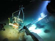 The bait deployment system on the EITS, known as the CLAM, is closed before it is recovered from the bottom.