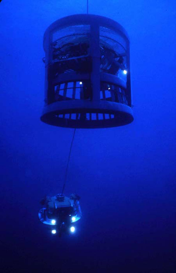 The small remotely operated vehicle (RCV-150), viewed from underwater.