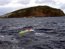 Pisces V surfaces after a dive in front of Macauley Island.