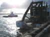 Research vessel Ka'imikai-o-Kanaloa (front right), resting in port at Tauranga, New Zealand.