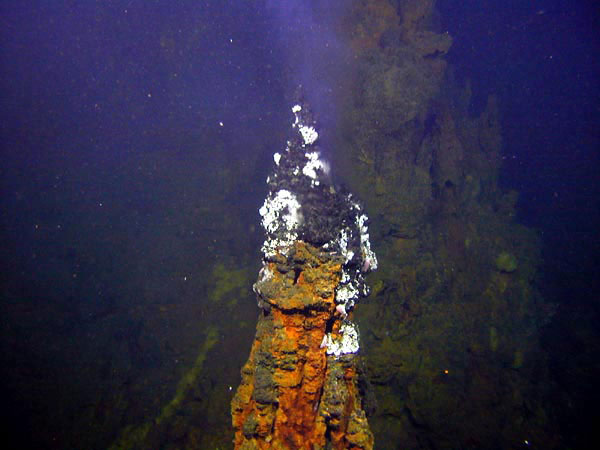 The northwest caldera wall is where we found several tall, active black smoker chimneys.