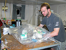 Processing microbes in a glove bag