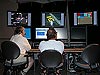 Deborah Kelley and Jeff Karson work at the Science Control Center