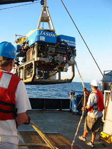 Scientists and crew work together to successfully deploy the ROV for yet another dive.