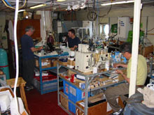 Chemists work long hours in the lab after a water sampling dive.