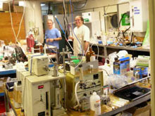 Chemists work long hours in the lab after a water sampling dive.