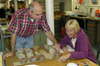 TDI-Brooks geochemist Bernie Bernard gives Cindy Petersen a chemistry lesson.