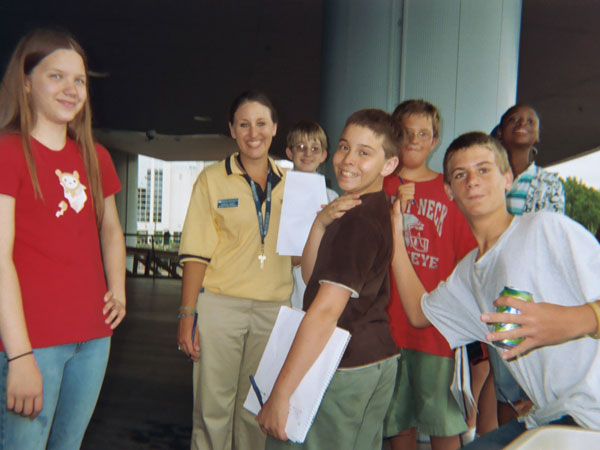 Emily, Jennifer, David, Marcus, Jacob, Joseph, Jazmine, and Tracy pose for the camera