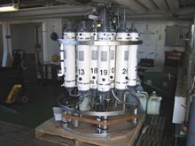 Conductivity, temperature and depth (CTD) package.  The large white cylinders on the frame are used to collect water samples over geothermal systems.