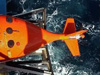 A series of six photos showing the launch of the Hugin AUV. A newly-developed AUV, owned and operated by C&C Technologies, was used to complete bathymetric surveys at four sites for this project.