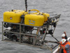 The Global Explorer ROV is hoisted back onto the deck after its successful test dive.