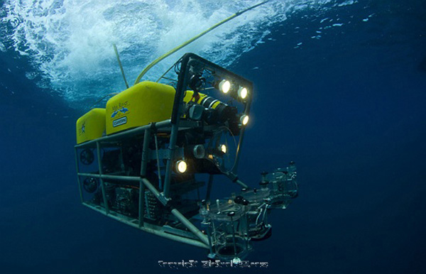 The ROV, with headlights on and samplers at the ready, begins its descent.