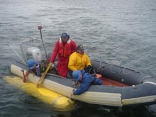 The BPAUV, or Nemo, is brought back to the TWR 841 vessel by the small support boat.