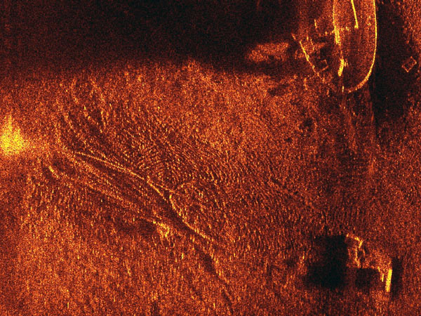 A SAS12 close-up view of the Prudence Island Shipwreck reveals several details on the vessel's deck and a lobster trap on the left side.