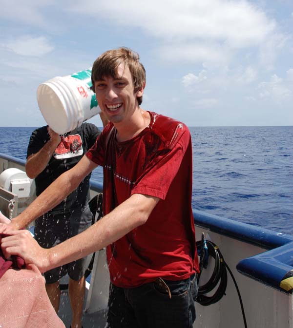 Marine Biologist undergraduate student gets doused with sea water by Dr. Steve
Haddock after his first submersible dive experience.
